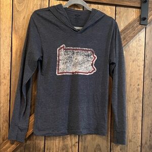 Woman’s blue hooded long sleeve